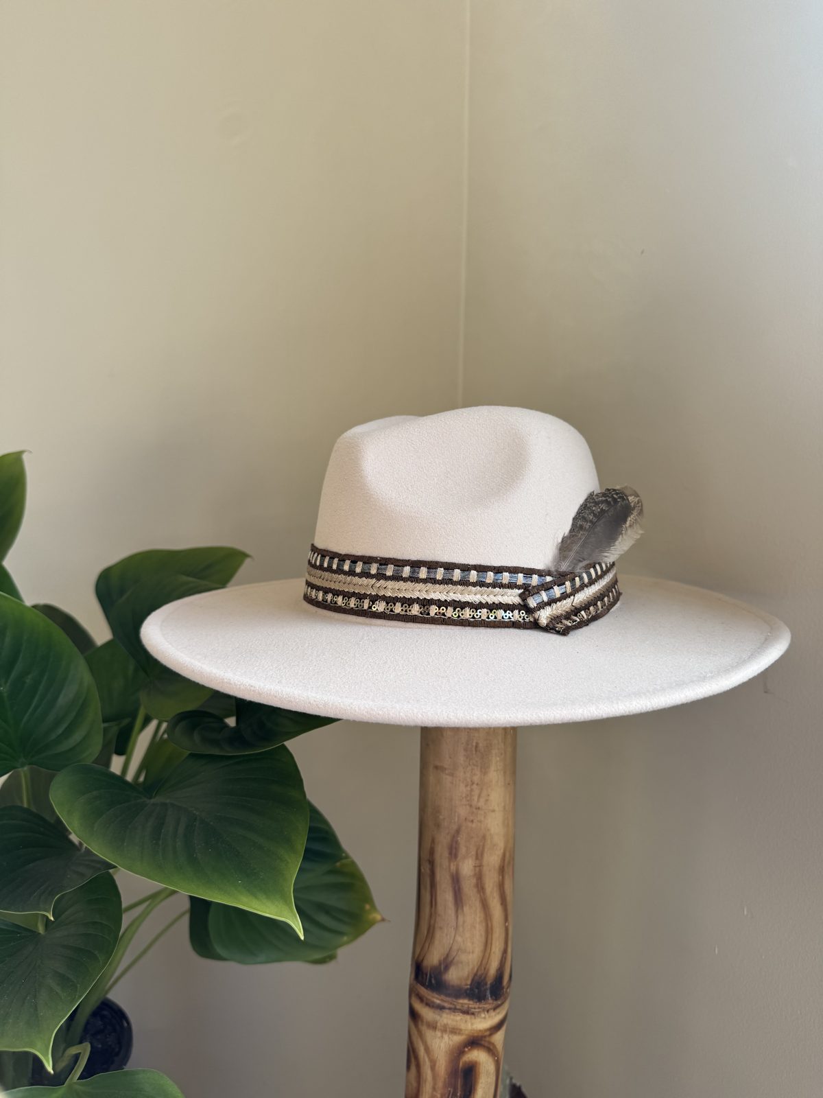 White fedora with dark beaded band