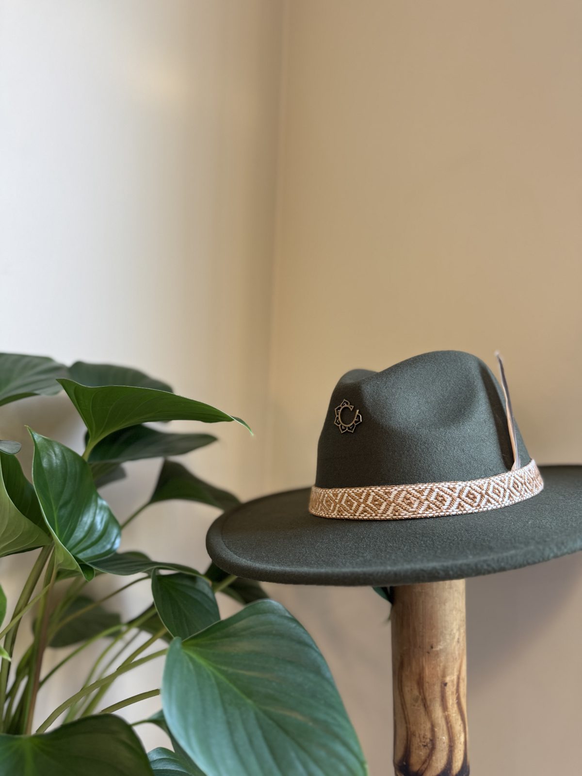 Forest green fedora with mustard woven band