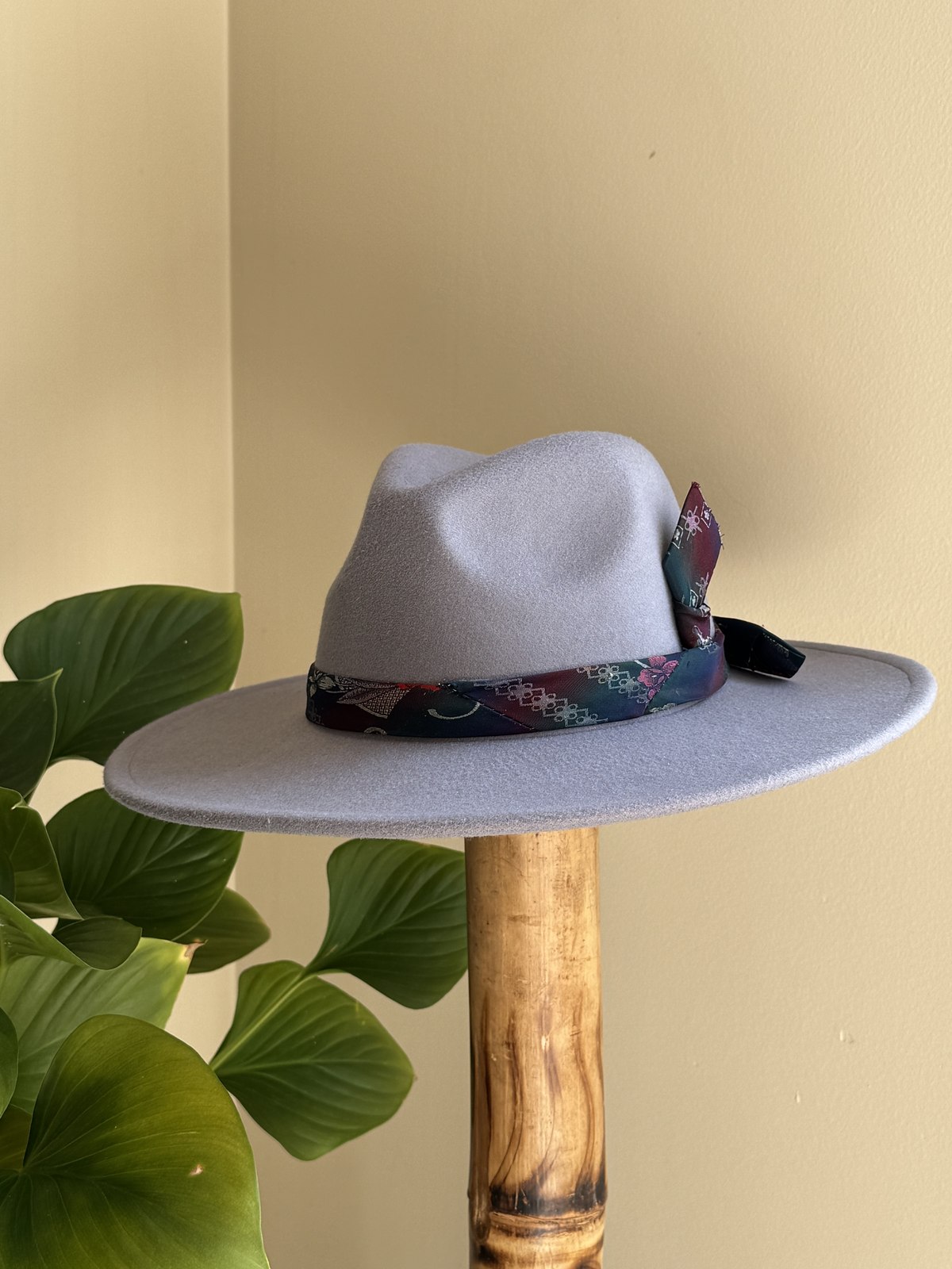 Grey fedora with navy floral silk scarf band