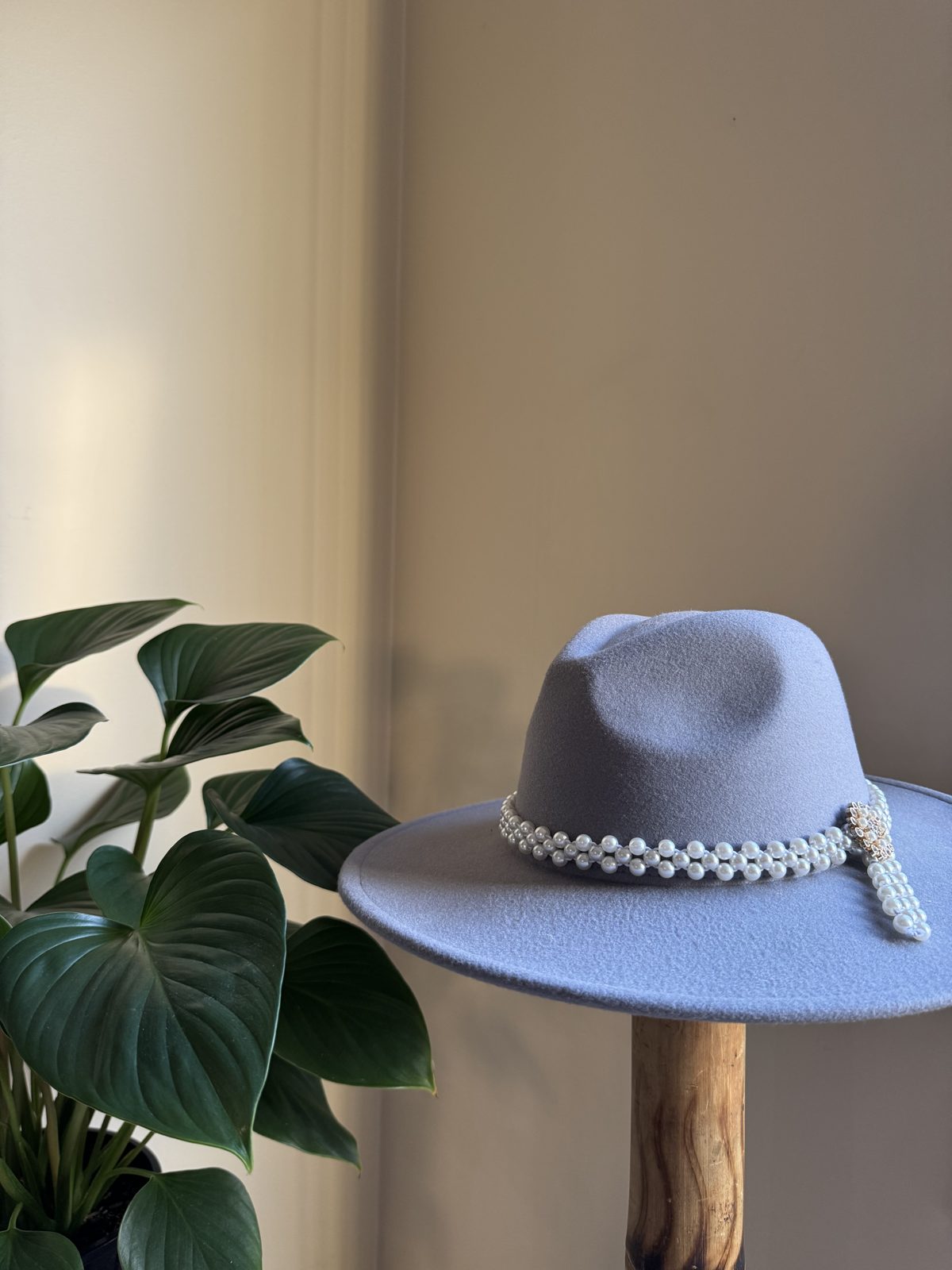 Pale blue fedora with pearl band